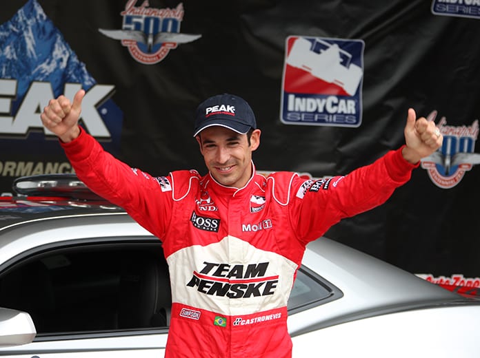 Helio Castroneves celebrates after winning the pole for the 2009 Indianapolis 500. (IMS Archives Photo)