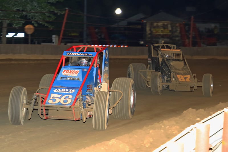 Tyler Courtney (97) chases Kevin Thomas Jr. at the Indiana State Fairgrouns. (Gordon Gill photo)