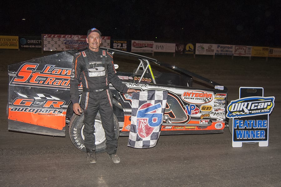 Tim Fuller in victory lane at Can-Am Speedway. (DIRTcar photo)