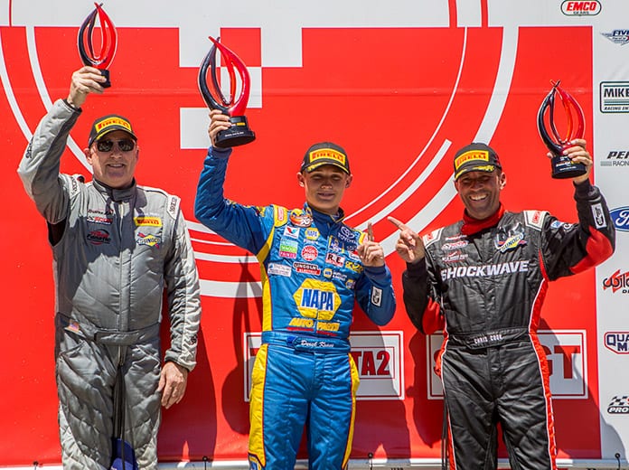 Derek Kraus (center) notched his first Trans Am Presented by Pirelli West Coast Championship victory on Sunday at Sonoma Raceway. (Trans-Am Photo)