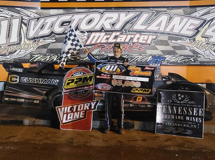 Cory Hedgecock stands in victory lane after winning Saturday's JT Kerr Memorial at 411 Motor Speedway. (Tim Owens Photo)