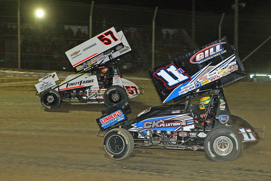 Kyle Larson (57) races ahead of Buddy Kofoid during Saturday's Ollie's Bargain Outlet All Star Circuit of Champions event at Attica Raceway Park. (Todd Ridgeway Photo)