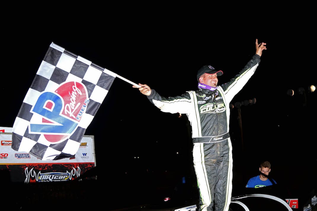 Brian Shirley celebrates winning Thursday's Summer Nationals feature at Spoon River Speedway. (Brendon Bauman photo)