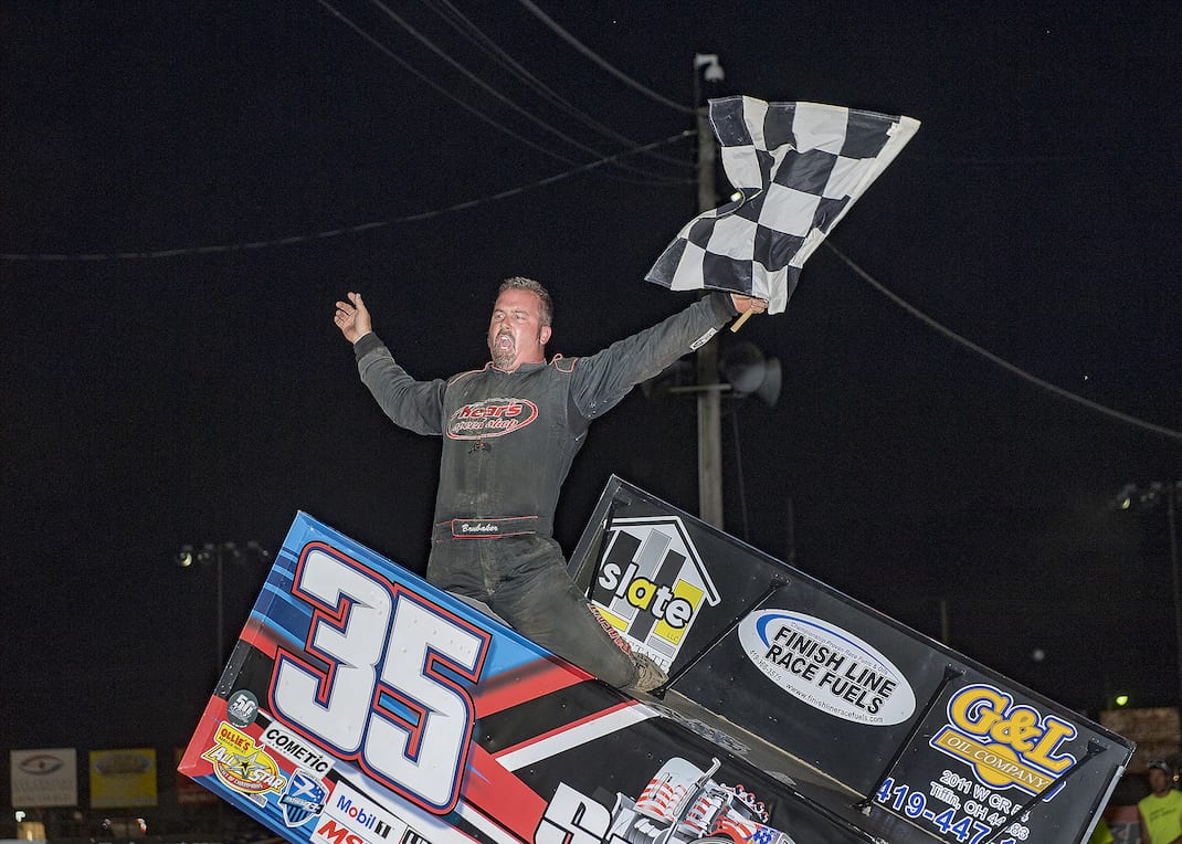 Stuart Brubaker celebrates winning Saturday's sprint car feature at Fremont Speedway. (Mike Campbell photo)