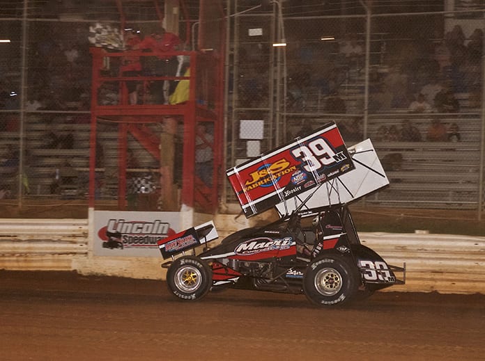Anthony Macri takes the checkered flag to win Saturday's 410 sprint car feature at Lincoln Speedway. (Dan Demarco Photo)