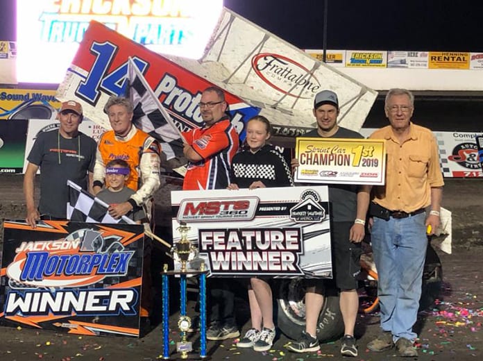 Brooke Tatnell in victory lane Friday at the Jackson Motorplex.