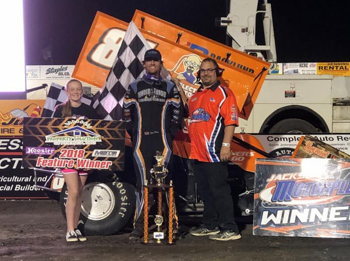 Jack Dover in victory lane on Friday at the Jackson Motorplex.