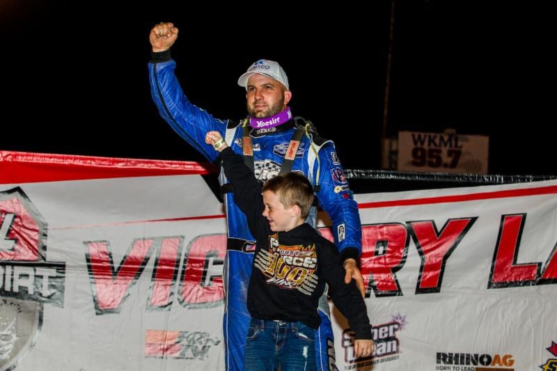 Kyle Bronson and his son in victory lane at Fayetteville Motor Speedway. (LOLMDS photo)