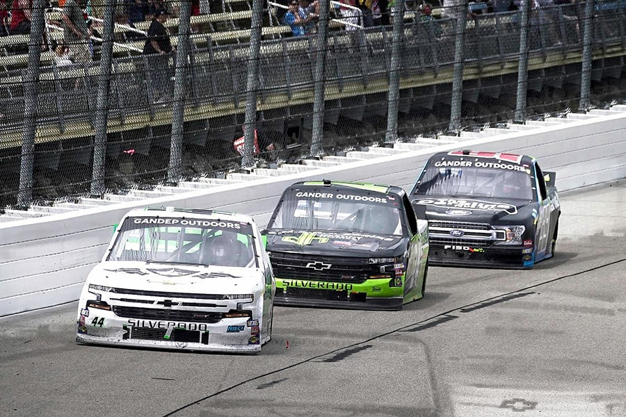 Ross Chastain (44) leads Brett Moffitt (24) and Ben Rhodes during Sunday's NASCAR Gander Outdoors Truck Series event at Iowa Speedway. (Ray Hague Photo)