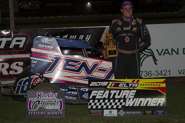 Tristan Guardino in victory lane at Delta Speedway. (Chris Cleveland photo)
