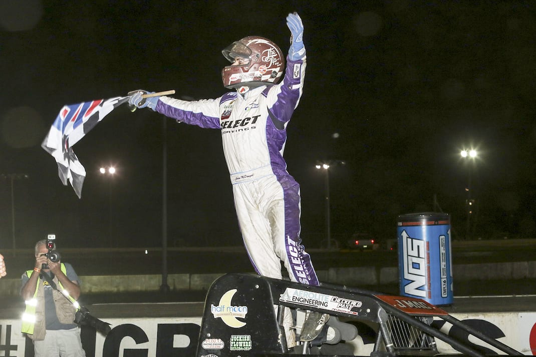 Jason McDougal celebrates winning Wednesday's USAC sprint car race at Bridgeport Speedway. (Dick Ayers photo)