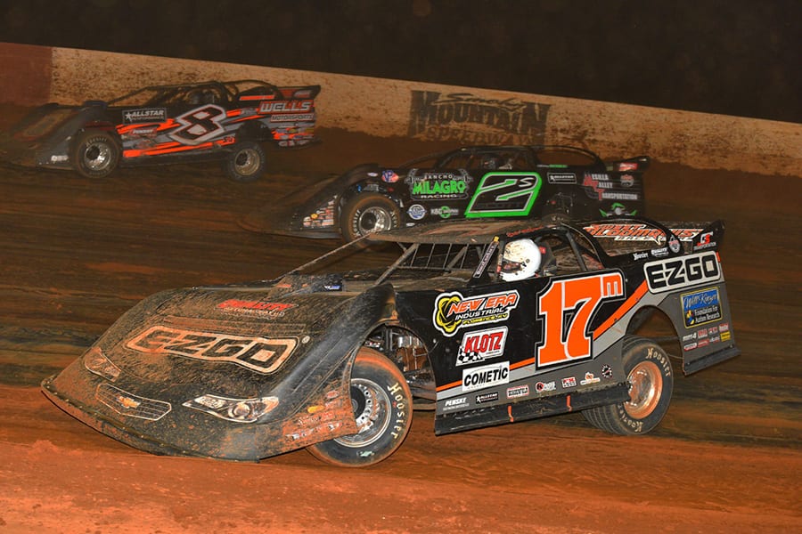 Dale McDowell (17m), Stormy Scott (2) and Kyle Strickler race three-wide during Saturday's Lucas Oil Late Model Dirt Series feature at Smoky Mountain Speedway. (Michael Moats Photo)