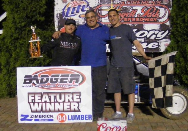 Davey Ray is joined by car owner Mark Ray, and chief mechanic Robbie Ray after winning Sunday Night's Zimbrick Chevrolet of Sun Prairie Badger Midget Racing Series feature at Angell Park Speedway