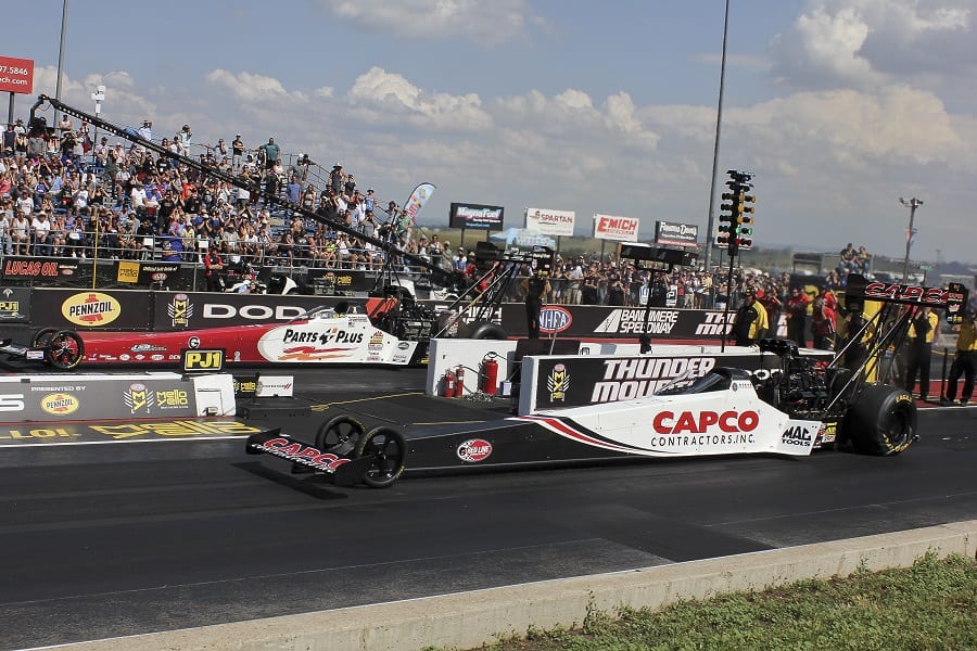 Steve Torrence (near lane) races Clay Millican in the Top Fuel final of Sunday's NHRA Mile-High Nationals at Bandimere Speedway. (Don Holbrook photo)