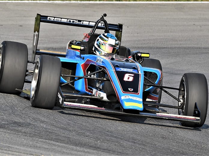 Christian Rasmussen on his way to victory Saturday at the Mid-Ohio Sports Car Course. (Al Steinberg Photo)