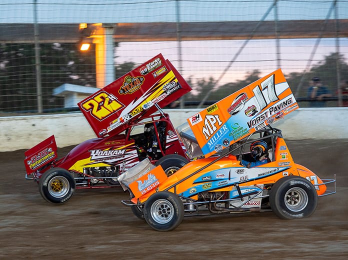 Jared Horstman (17) passes leader Randy Hannagan en route to victory in Friday's K&L Ready Mix NRA Sprint Invaders feature at Limaland Motorsports Park. (Mike Campbell Photo)