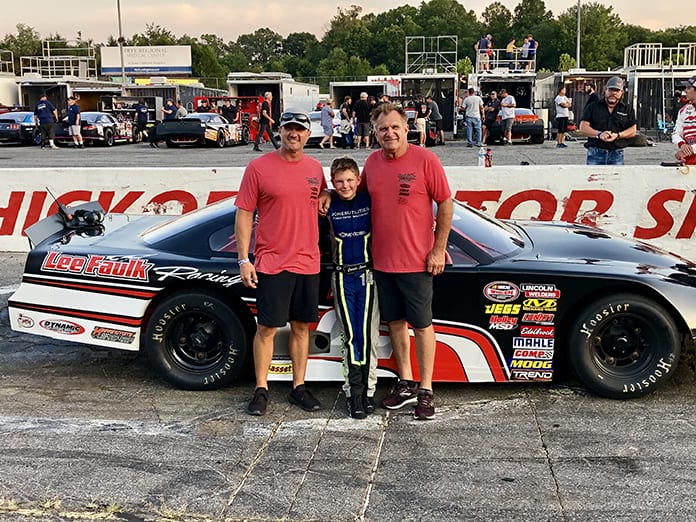 Conner Jones (center) is joined by Lee Faulk Racing and Development's Michael Faulk (left) and Lee Faulk after Jones finished third in his limited late model debut on Saturday at Hickory Motor Speedway. (MPM Marketing Photo)