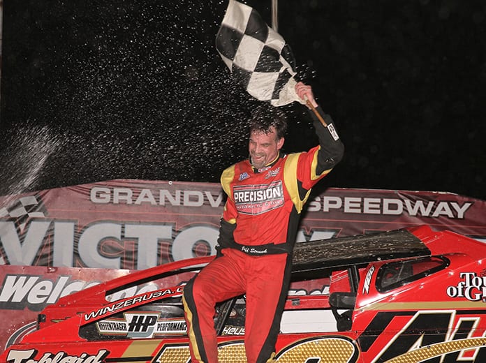 Jeff Strunk celebrates his victory in NASCAR 358 Modified action Tuesday at Grandview Speedway. (Dan Demarco Photo)