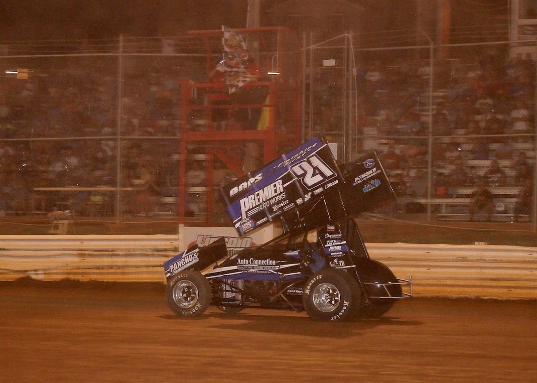 Brian Montieth takes the checkered flag Monday night at Lincoln Speedway. (Dan Demarco photo)