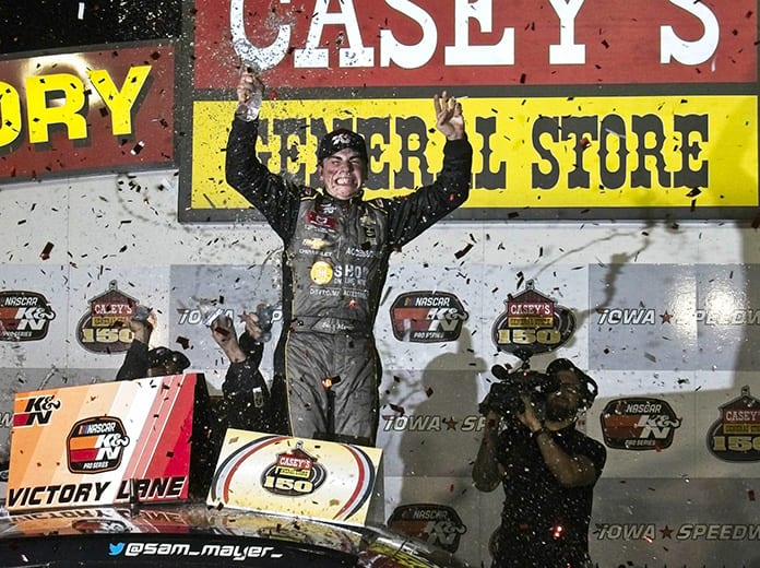 Sam Mayer celebrates after winning Friday's NASCAR K&N Pro Series event at Iowa Speedway. (Ray Hague Photo)