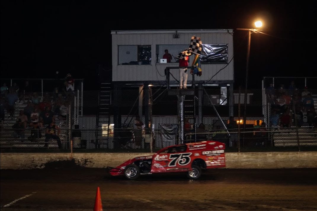 Terry Phillips takes the checkered flag at Central Missouri Speedway.