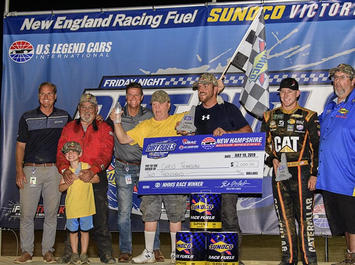 Matt Goslant, New Hampshire Motor Speedway's vice president of operations and development (far left) and David McGrath, New Hampshire Motor Speedway's executive vice president and general manager (third from left) with Chris Transeau, winner of the U.S. Legend Cars International feature (holding check) and Monster Energy NASCAR Cup Series driver Daniel Hemric (second from right), who finished second during the Friday Night Dirt Duels presented by New England Racing Fuel at New Hampshire Motor Speedway's newest racing surface, The Flat Track, on Friday. (NHMS/Alan MacRae Photo)