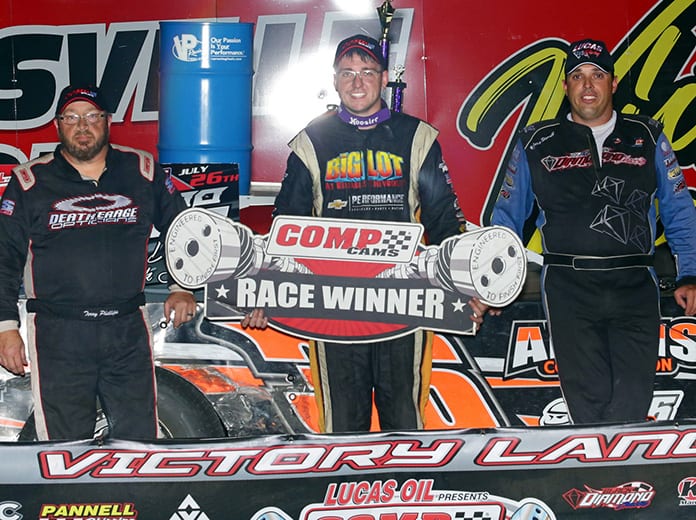 Logan Martin (center) raced to his first-career COMP Cams Super Dirt Series win on Friday night at Batesville Motor Speedway. He’s joined by runner-up Jesse Stovall (right) and third-place finisher Terry Phillips (left). (Woody Hampton Photo)