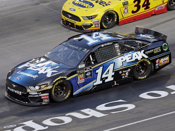 Clint Bowyer's crew chief Michael Bugarewicz was one of three crew chiefs to be fined $10,000 for loose lug nuts after Saturday's race at Bristol Motor Speedway. (HHP/Alan Marler Photo)