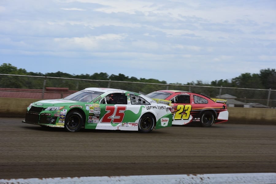 Michael Self (25) passes Bret Holmes during Sunday's ARCA Menards Series Allen Crowe 100 at the Illinois State Fairgrounds. (Mark Funderburk photo)