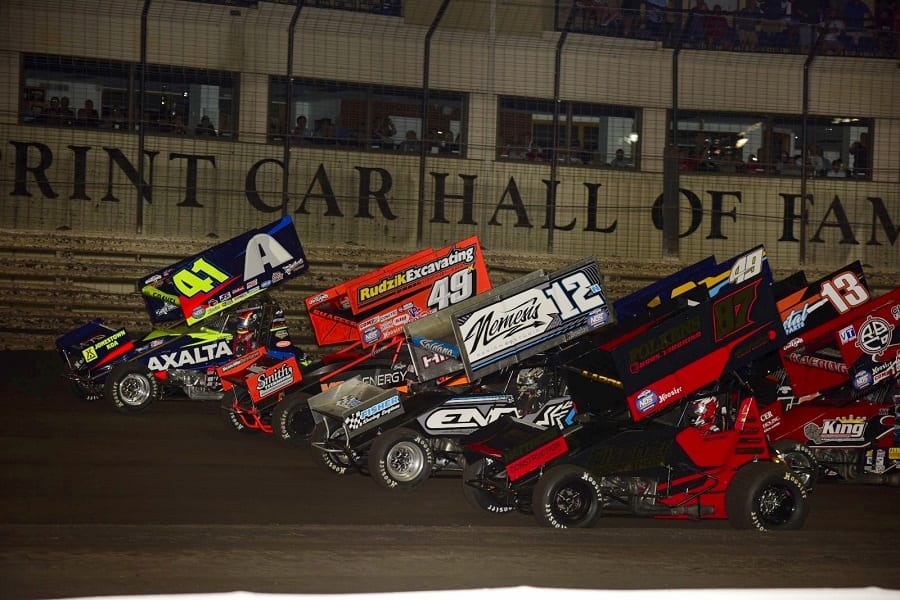 The four-wide parade lap prior to Saturday's 59th annual NOS Energy Drink Knoxville Nationals finale. (Mark Funderburk photo)
