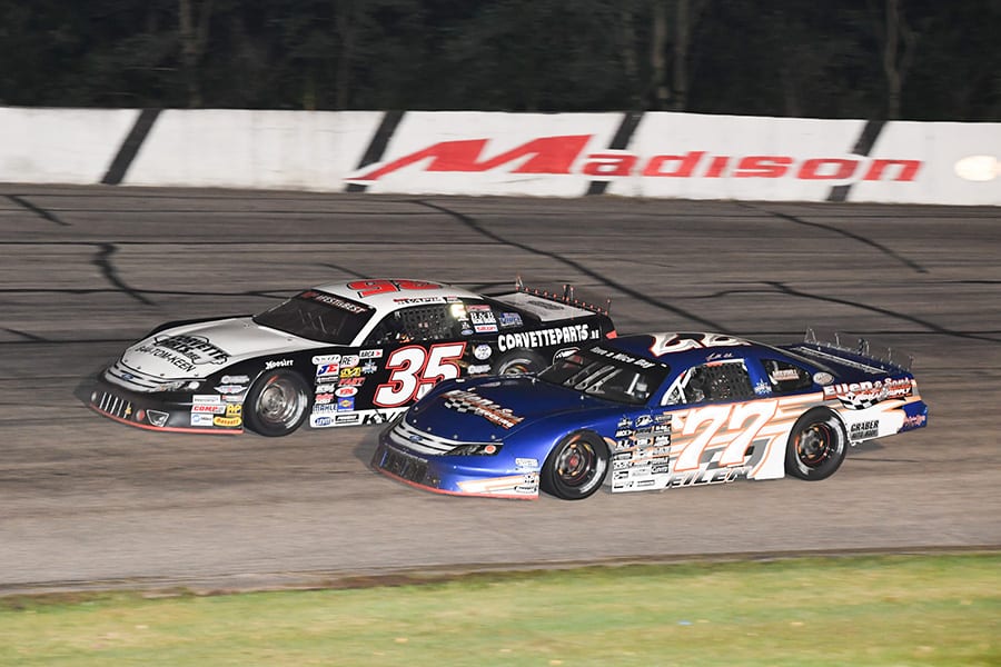 Jonathan Eilen (77) races under Carson Kvapil during Friday's ARCA Midwest Tour Howie Lettow Classic 100 Friday at Madison Int'l Speedway. (Doug Hornickel Photo)
