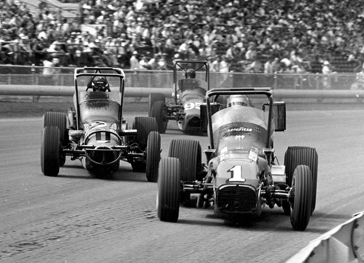 A.J. Foyt (1) shows the way during a championship car field at the DuQuoin (Ill.) State Fairgrounds in 1973.