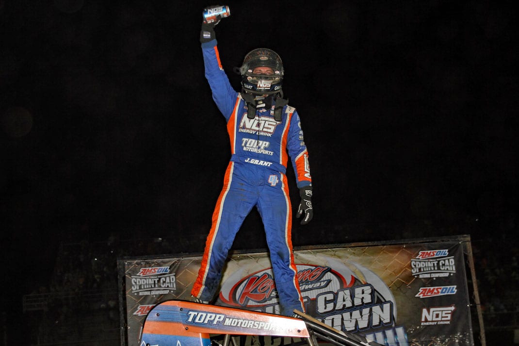 Justin Grant celebrates victory at Kokomo Speedway. (Jim DenHamer photo)