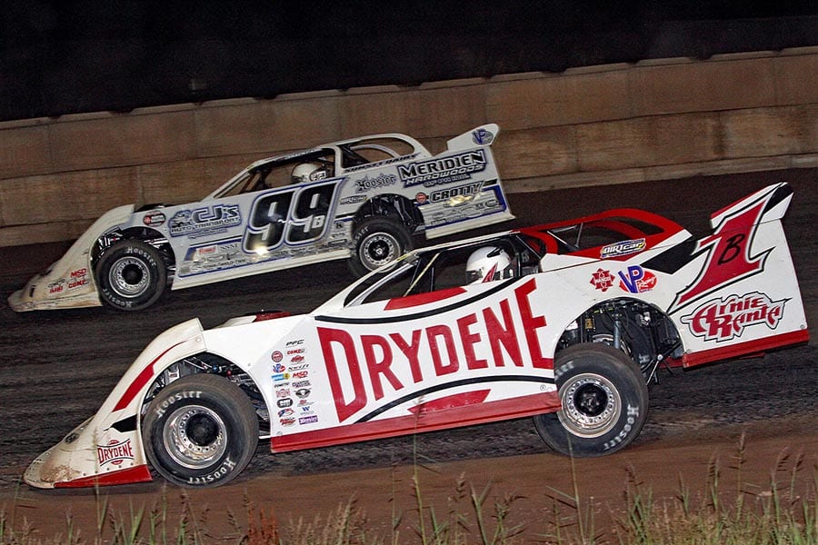 Brent Larson (B1) battles Boom Briggs during Tuesday's World of Outlaws Morton Buildings Late Model Series event at Shawano Speedway. (Jim Denhamer Photo)