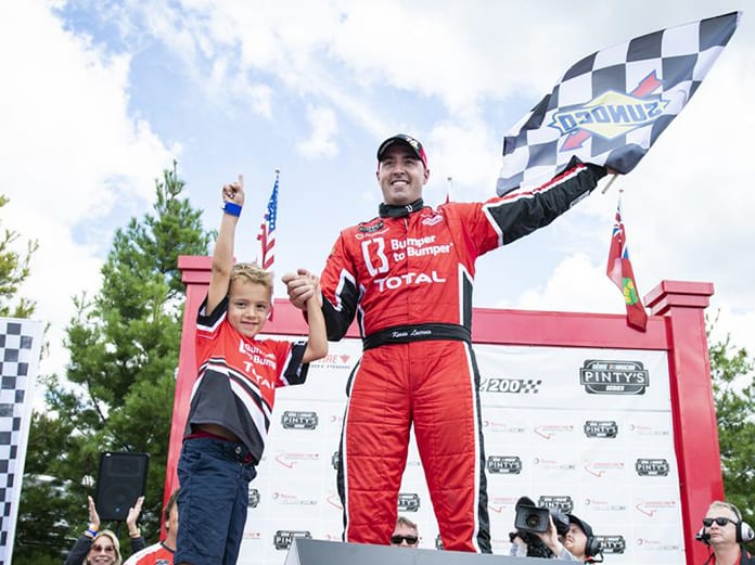 Kevin Lacroix celebrates his victory Sunday at Canadian Tire Motorsport Park. (NASCAR Photo)