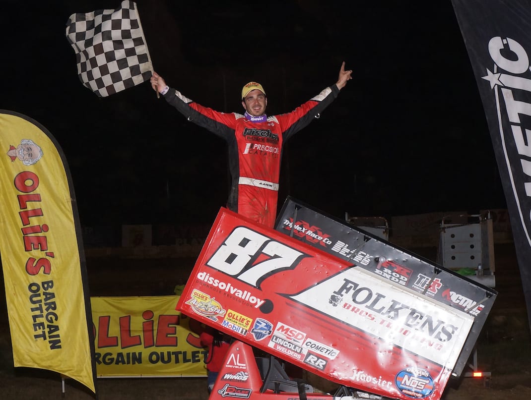 Aaron Reutzel in victory lane at Plymouth Speedway. (Gary Gasper photo)