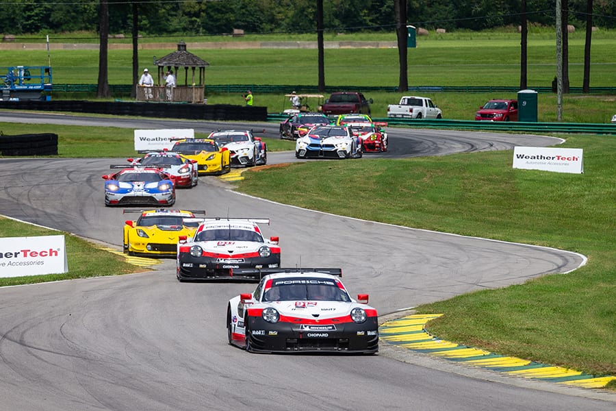 The No. 912 Porsche of Earl Bamber and Laurens Vanthoor leads the way early in Sunday's Michelin GT Challenge at Virginia Int'l Raceway. (Sarah Weeks Photo)