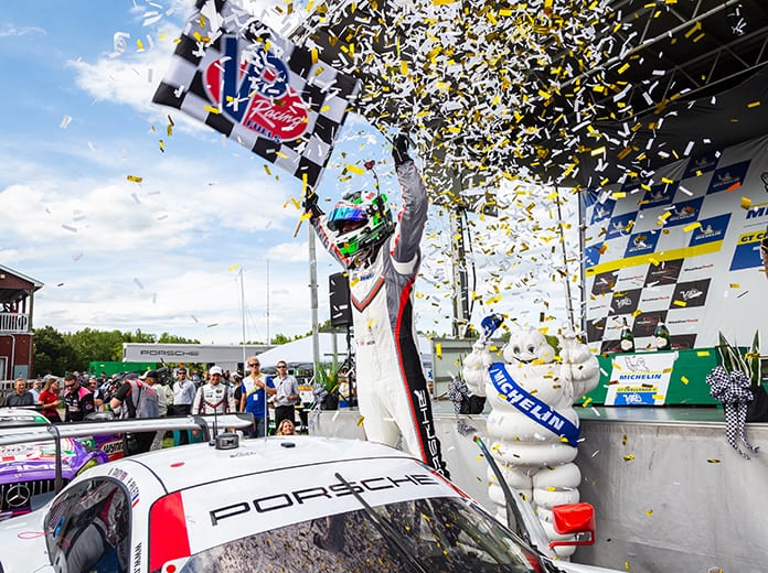 Nick Tandy celebrates after winning the GT Le Mans portion of the Michelin GT Challenge with co-driver Patrick Pilet Sunday at Virginia Int'l Raceway. (Sarah Weeks Photo)