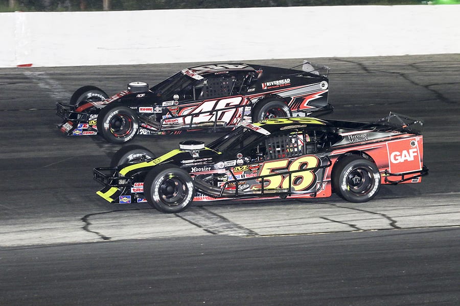 Craig Lutz (46) battles Eric Goodale during Wednesday's NASCAR Whelen Modified Tour feature at Thompson Speedway Motorsports Park. (Dick Ayers Photo)