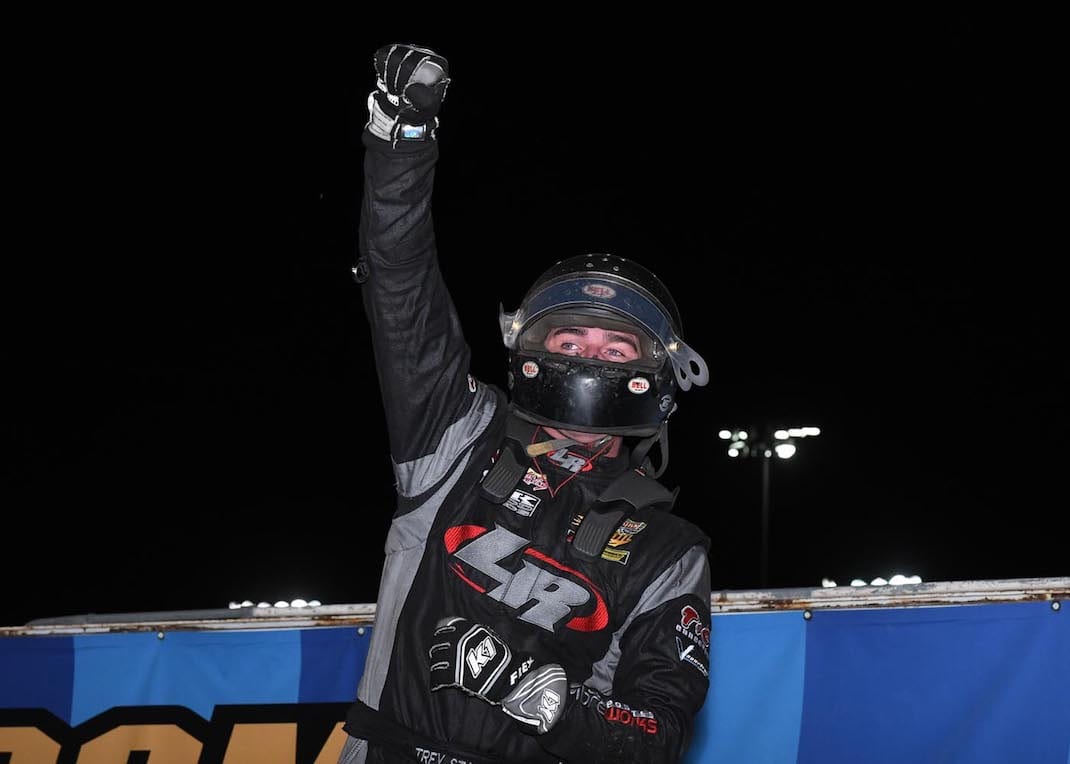 Trey Starks celebrates victory at Knoxville Raceway. (Frank Smith photo)