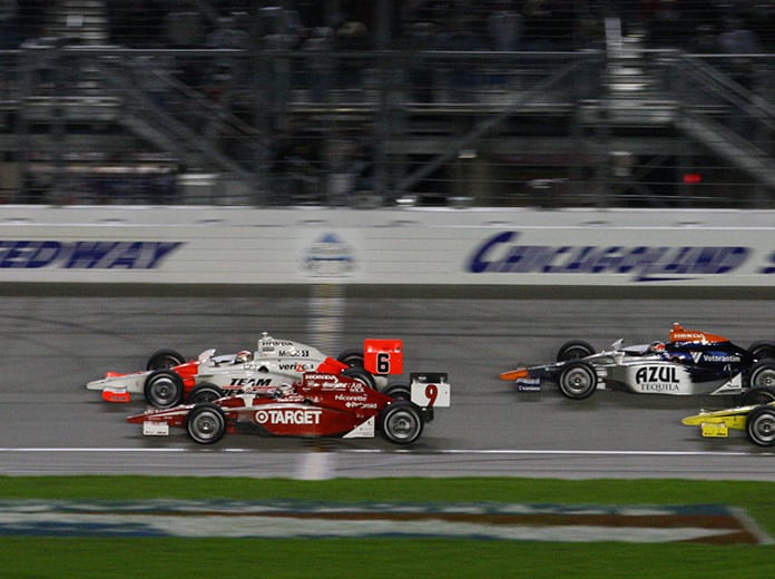 Ryan Briscoe (6) beats Scott Dixon (9) to the finish line in 2009 at Chicagoland Speedway. (IndyCar Photo)