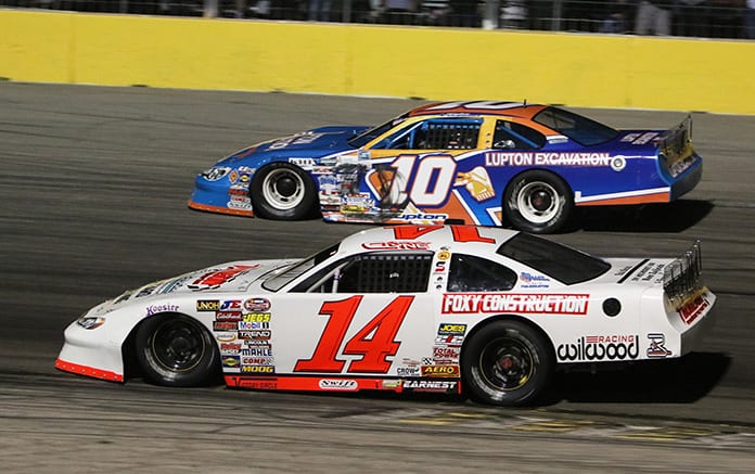 Chris Clyne (14) battles Dylan Upton during Saturday's super late model feature at The Bullring at Las Vegas Motor Speedway. (Barry Ambrose Photo)