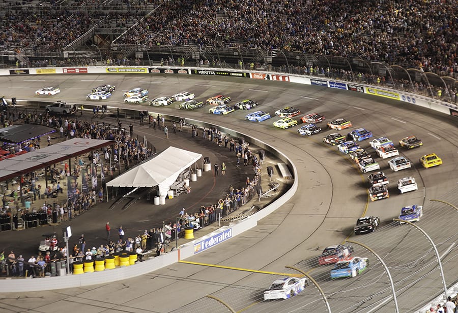 Drivers battle for position early in Saturday's Federated Auto Parts 400 at Richmond Raceway. (HHP/Harold Hinson Photo)