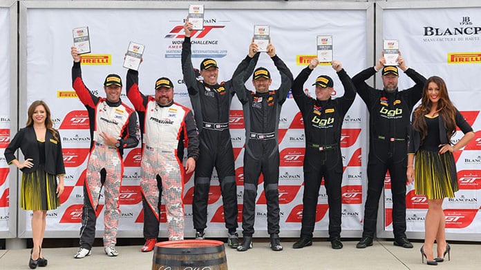 Christian Szymczak and Matthew Fassnacht (center) won Sunday's Pirelli GT4 America SprintX event at Watkins Glen Int'l.