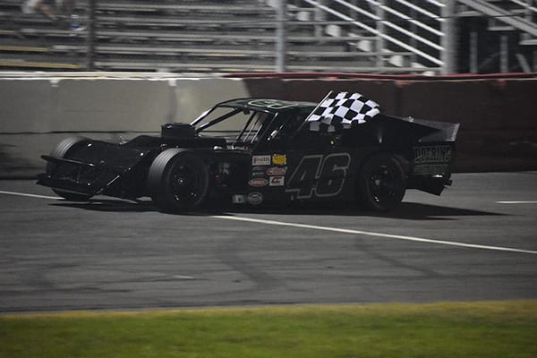 Derrick Doering celebrates his Modified win Saturday night at All-American Speedway. (Don Thompson Photo)