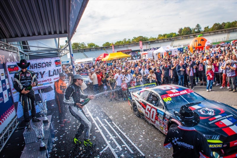 Loris Hezemans celebrates his victory Sunday at the Hockenheimring. (NASCAR photo)