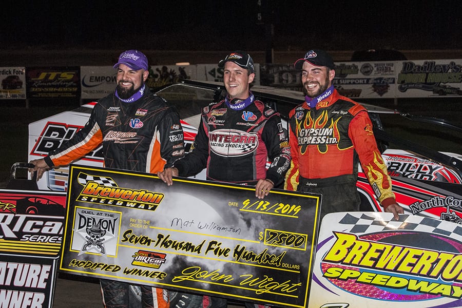Mat Williamson (center) shares the podium with Chris Hile and Larry Wight. (DIRTcar photo)