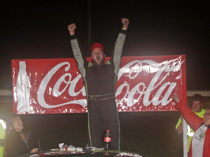 Rich Dubeau celebrates after winning the Labor Day Classic Saturday at Thunder Road Int'l Speedbowl. (Alan Ward Photo)