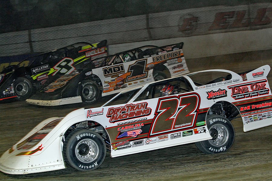 Chris Ferguson (22), Chad Simpson (1) and Kyle Strickler battle for position during Friday's World 100 preliminary event at Eldora Speedway. (Julia Johnson Photo)