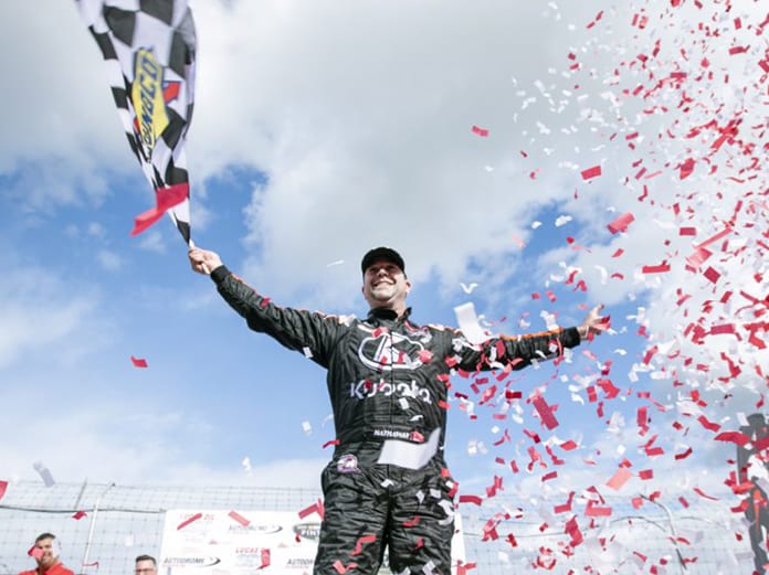 Jason Hathaway celebrates a victory Sunday at Autodrome Saint-Eustache. (NASCAR Photo)